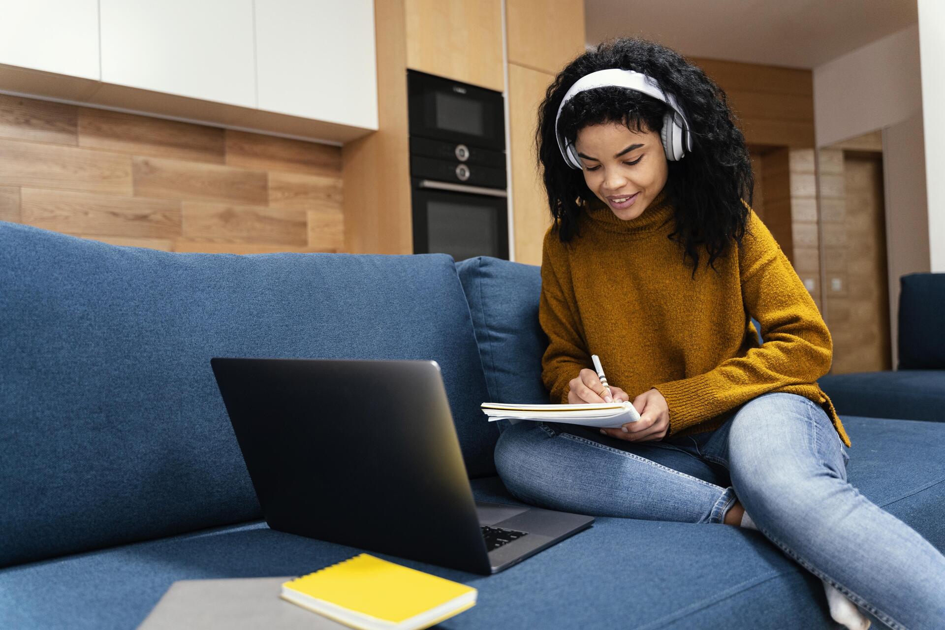 teenage-girl-with-laptop-and-hea